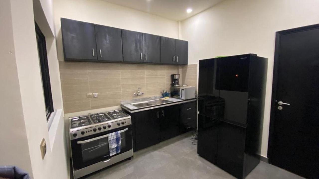 The One Apartment Yaounde Bagian luar foto