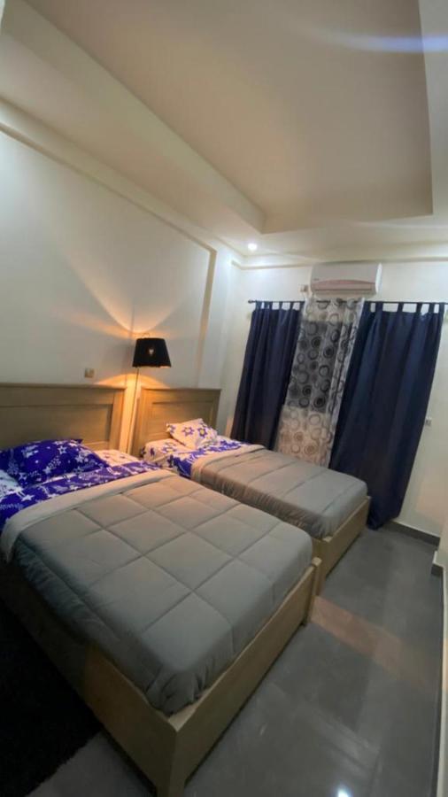 The One Apartment Yaounde Bagian luar foto